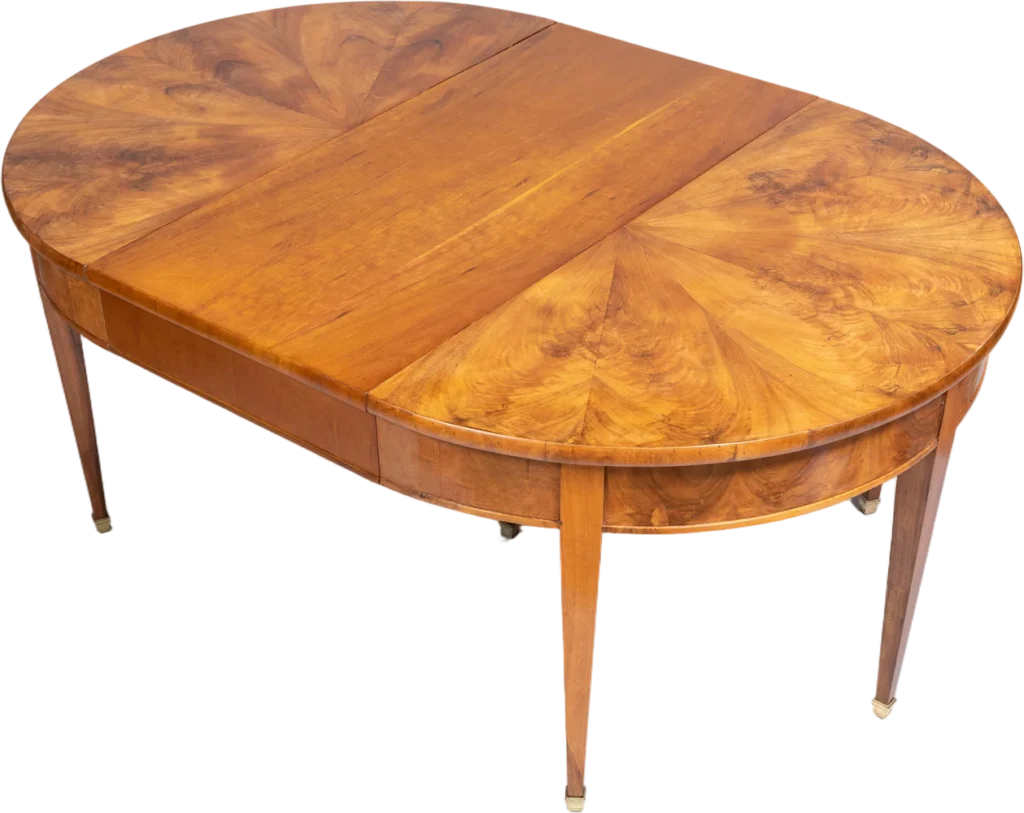 Biedermeier- Auszugtisch mit sternförmig furnierter Platte.