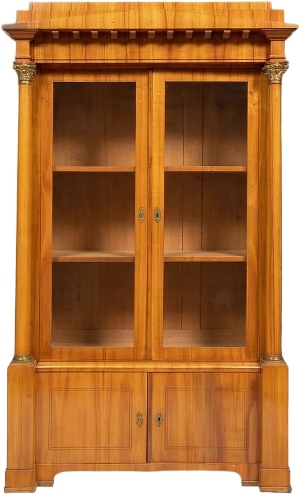 Hochqualitatives Biedermeierensemble bestehend aus einem zierlichen Halbschrank in Kommodenform; einem Bücherschrank und einem Schreibsekretär. Hervorragender Originalzustand.