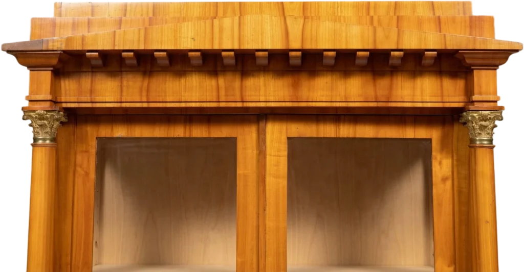 Hochqualitatives Biedermeierensemble bestehend aus einem zierlichen Halbschrank in Kommodenform; einem Bücherschrank und einem Schreibsekretär. Hervorragender Originalzustand.